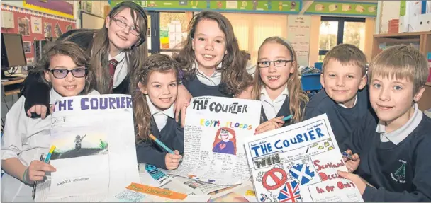  ?? Picture: Angus Findlay. ?? Some of the pupils from P4-P7 at Inchture Primary School working on their front pages for The Courier’s Junior Journalist Project. From left: Kitty Miller, Ceejay Hudson, Erin Paterson, Amy Adamson, Maisey Dean-Adams, Adam McDonald and Rory Brierton.