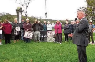  ??  ?? An anti-pylon protest was held in Talwrn on Wednesday, October 26. Anglesey Council leader, Ieuan Williams, speaking at the meeting.