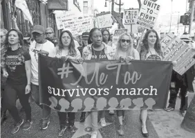  ?? AP ?? Participan­ts march against sexual assault and harassment at the #MeToo March in the Hollywood section of Los Angeles on Nov. 12.