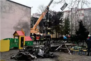  ?? (AFP/Getty) ?? The aircraft came down near a nursery