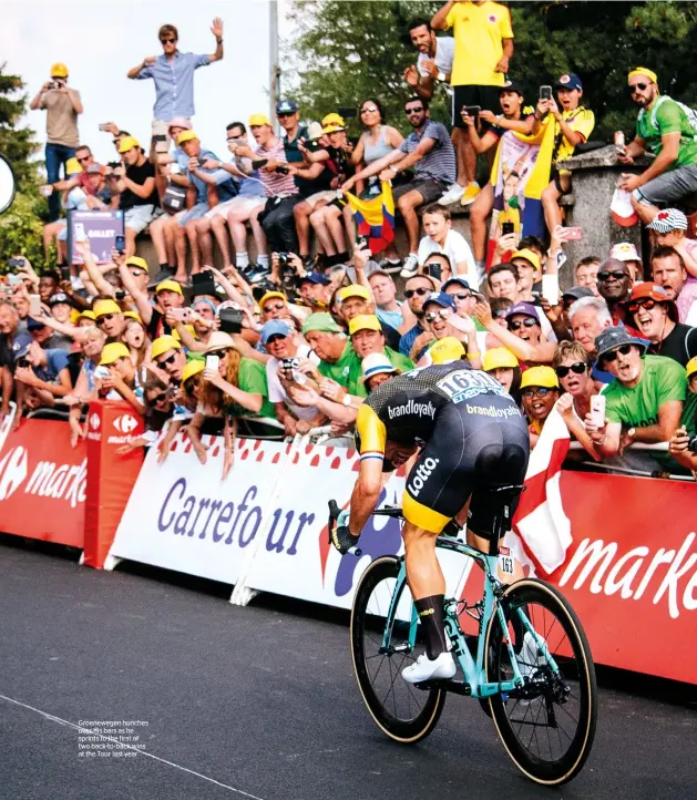  ??  ?? Groenewege­n hunches over his bars as he sprints to the first of two back-to-back wins at the Tour last year