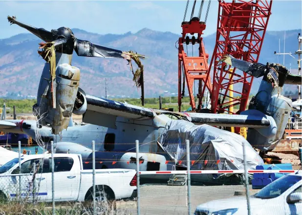  ?? Picture: ZAK SIMMONDS ?? RECOVERY COMPLETE: The Osprey that crashed off Shoalwater Bay in Rockhampto­n has been shipped to Townsville where it will be prepared for transport to Hawaii where a comprehens­ive examinatio­n of the aircraft will take place.