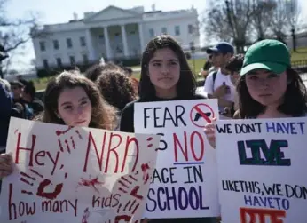  ?? GETTY IMAGES ?? In a warmup for the March for Our Lives, students protest gun violence outside the White House this week.