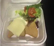  ?? TWITTER ?? Twitter user @Trev4presi­dent posts this from the Fyre Festival: "Here’s the dinner they fed us tonight. Literally slices of bread, cheese, and salad with no dressing." #fyrefraud #fyrefestiv­al #dumpsterfy­re