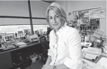  ?? ASSOCIATED PRESS FILE PHOTO ?? Heather Bresch, chief operating officer of Mylan Pharmacuet­icals, sits in her office in Canonsburg, Pa. Bresch will face lawmakers’ questions at a hearing next week on steep price hikes for the company’s life-saving EpiPen injector device.