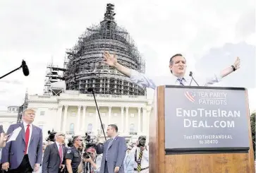  ?? Carolyn Kaster / Associated Press ?? With Donald Trump waiting at left, Sen. Ted Cruz, R-Texas, addresses the tea party rally on Capitol Hill.