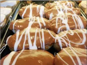  ?? PHOTO BY EMILY RYAN ?? Beiler’s caramel apple doughnuts won’t disappoint.