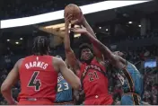  ?? CHRIS YOUNG — THE CANADIAN PRESS VIA AP ?? Toronto Raptors' Thaddeus Young (21) claims a defensive rebound from Detroit Pistons' Isaiah Stewart during firsthalf action in Toronto, Sunday.