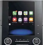  ??  ?? The Koleos Signature’s R-LINK 2 Multimedia System is compatible with Apple CarPlay and Android Auto.