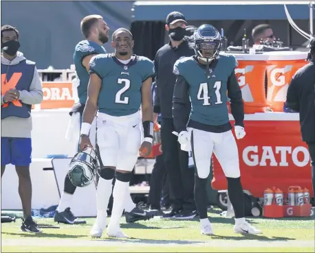  ?? CHRIS SZAGOLA - FOR THE ASSOCIATED PRESS ?? Eagles’ second-round pick Jalen Hurts (2) looks on fromthe sideline Sunday during the Birds’ 37-19loss to the Los Angeles Rams.