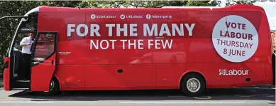  ??  ?? Liability: Jeremy Corbyn is conspicuou­sly absent from the side of his red battle bus