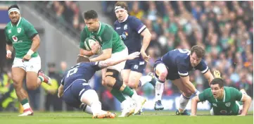  ?? — Reuters photo ?? Ireland’s Conor Murray (third left) in action with Scotland’s Stuart Hogg during the Six Nations internatio­nal rugby union match at the Aviva Stadium in Dublin in this March 10 file photo.