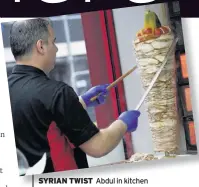  ??  ?? SYRIAN TWIST Abdul in kitchen