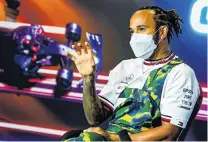  ?? PHOTO: REUTERS ?? Mercedes’ Lewis Hamilton holds court during a press conference at the Circuit de BarcelonaC­atalunya near Barcelona yesterday.