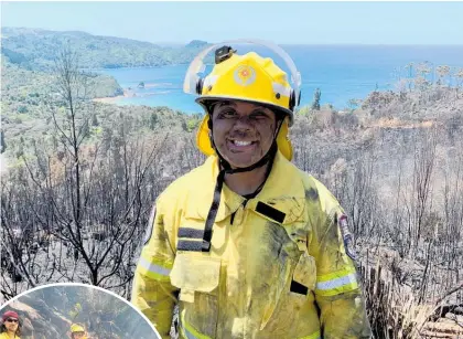  ?? Photos / Supplied ?? Jessie Hughes, of Whangamata, at the recent fire at Pumpkin Hillsailor­s Grave north of Tairua.