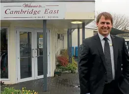  ?? MIKE BAIN ?? At Cambridge East School, Principal Hamish Fenemor said pupils had received videos and letters from its sister school in Wuhan China — the epi-centre of the outbreak.