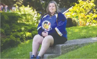  ?? Arlen redekop ?? Rosalie Macdonald, seen outside her home in New Westminste­r this week, is a hockey player whose followup knee surgery, scheduled for April 29, was cancelled.