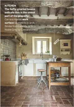  ??  ?? KITCHEN
The hefty, gnarled beams indicate this is the oldest part of the property.
Carrara marble work
surface sourced by b-arch. Similar from Lapicida, or 5211 Noble Grey by Caesarston­e