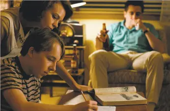  ?? Photos by Scott Garfield / IFC Films ?? Carey Mulligan (left) as Jeanette Brinson, Ed Oxenbould as Joe Brinson, and Jake Gyllenhaal as Jerry Brinson in director Paul Dano’s “Wildlife.”