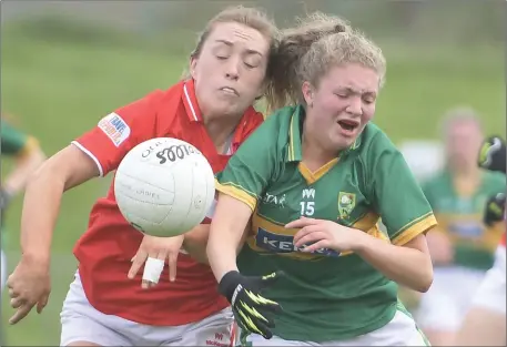  ??  ?? Kerry’s Niamh Ní Chonchúir and Cork’s Fiona Keating clash during the Munster Ladies MAFC Final in Mallow. Picture John Tarrant