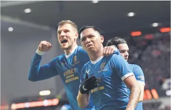  ?? — AFP photo ?? Rangers’ Colombian striker Alfredo Morelos (centre) celebrates scoring the opening goal during the UEFA Europa League Group A football match between Rangers and Sparta Prague at the Ibrox Stadium in Glasgow.