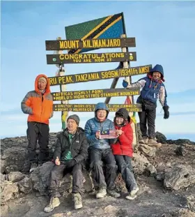  ?? ?? The writer (far right) and her friends on the roof Of africa.