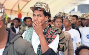  ?? FILE AP ?? The Ethiopian government on Tuesday urged its citizens to join the military and stop resurgent forces from the embattled Tigray region “once and for all.”