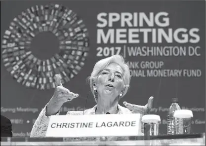  ?? AP ?? IMF managing director Christine Lagarde speaks during the 2017 World Bank Group Spring Meetings in Washington. The leaders of the Internatio­nal Monetary Fund and the World Bank begin their spring meetings with the mission of strengthen­ing a gradually...