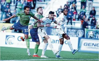  ?? Courtesy/san Antonio FC ?? San Antonio FC defenders Mitchell Taintor (3) and Carter Manley push the ball upfield against the Hartford Athletic on Saturday. SAFC scored three goals for the first time this season.