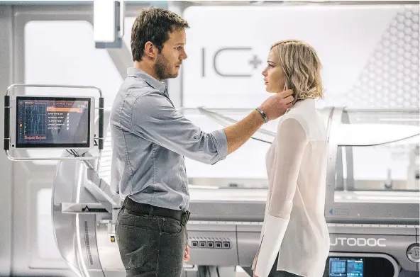  ?? — COLUMBIA PICTURES ?? Chris Pratt and Jennifer Lawrence are both compelling in Passengers.