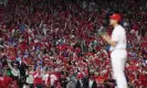  ?? Photograph: Bill Streicher/USA Today Sports ?? ‘Nothing else is really happening anywhere’: Fans wave towels as the Phillies pitcher Aaron Nola (27) prepares to throw in game four.