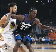  ?? BEN MARGOT/THE CANADIAN PRESS/AP ?? Timberwolv­es forward Andrew Wiggins, right, says he wants to play for Team Canada again someday.