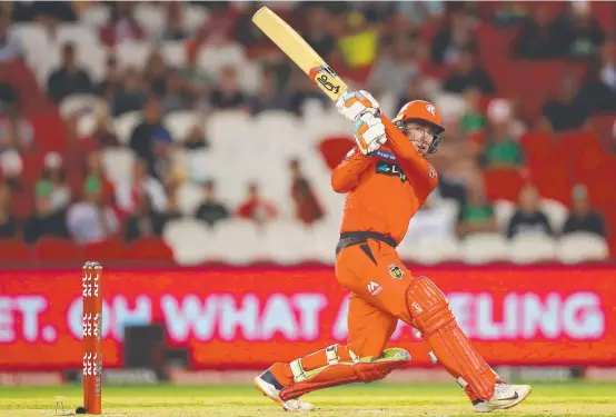  ??  ?? Mackenzie Harvey of the Renegades bats during the BBL derby bteween match the Renegades and the Melbourne Stars. Piture: Getty Images