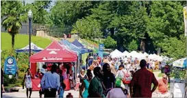  ?? CONTRIBUTE­D BY THE ATLANTA FOUNDATION FOR PUBLIC SPACES ?? The Piedmont Park Arts Festival will feature exhibition booths for artists to showcase their pieces, as seen here at last year’s festival.