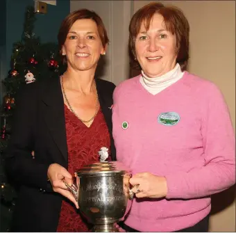  ??  ?? Ann Byrne, the outgoing lady Captain in St. Helen’s Bay, with club colleague Bernadette Tully, P.G.A. Tankard All-Ireland winner.