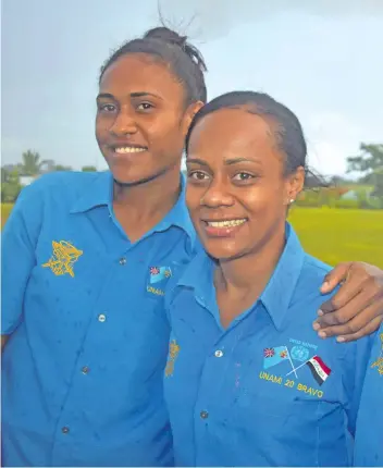  ?? Photo: Waisea Nasokia ?? Private Elani Dau and Lance Corporal Filomena Vularogoya­wa in Namaka, Nadi on December 25, 2017.