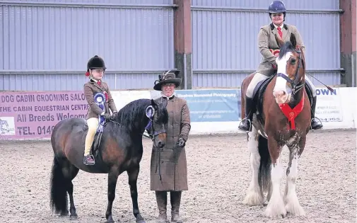  ??  ?? TOP PRIZES: Ridden championsh­ip winners Steph Slater and Bulwark Bay, right, with Ella Anderson and Pumphill Tirella who took reserve