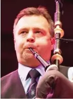  ?? ?? MBE: Pipe major Stuart Liddell