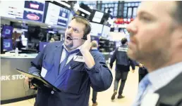  ??  ?? MELTDOWN Stock markets were in freefall over fears of a global recession