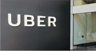  ?? ERIC RISBERG/AP FILES ?? Ride-hailing company Uber revealed that a year-old hack compromise­d the data of 57 million Uber riders. The informatio­n stolen included names, email addresses and mobile phone numbers.