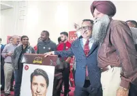  ?? GRAEME FRISQUE TORSTAR FILE PHOTO ?? Brampton Centre MP Ramesh Sangha, centre, was first elected as a Liberal in 2015, but will now sit as an Independen­t.