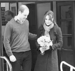  ?? FRED DUVAL/ GETTY IMAGES ?? Prince William and Kate, shown leaving the hospital Thursday, insist they had not complained about the hoax.