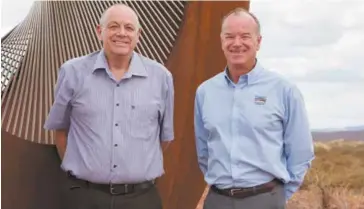  ?? Photograph­y: Jasmine Creative. ?? Pilbara Developmen­t Commission (PDC) chief executive officer Terry Hill and chairman Brendan Hammond at the Resilience Sculpture, Paraburdoo.