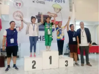  ??  ?? Ruelle "Tawing" Canino of Kauswagan Elementary School takes the podium after giving Cagayan de Oro's first gold in rapid chess of the ongoing 2019 Batang Pinoy Mindanao Leg games in Tagum City. (Supplied Photo)