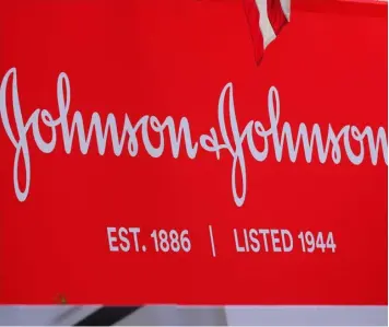  ?? ?? ▲The company logo for Johnson & Johnson is displayed to celebrate the 75th anniversar­y of the company’s listing at the New York Stock Exchange (NYSE) in New York, U.S.