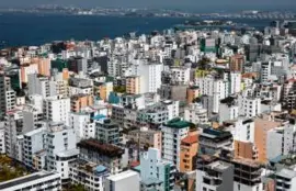  ?? ELKE SCHOLIERS/THE NEW YORK TIMES ?? High-rises dominate Malé, by some measures, the most densely populated island on Earth.