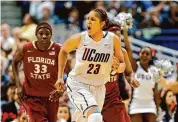  ?? Jim Rogash/ST ?? UConn’s Maya Moore reacts in the final minutes of a win over Florida State on Dec. 21, 2010 in Hartford.