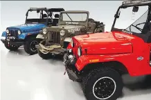  ??  ?? They may look like American Jeeps, but these vintage and new Mahindra Roxor trucks were designed and built by India’s largest SUV manufactur­er.