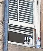  ?? ?? APPALLING Residents are having to chill food and drinks on their window sills as there are no fridges in the accommodat­ion