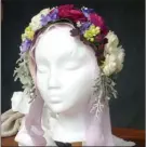  ?? Dean Fosdick via AP ?? This photo shows a floral tiara at a workshop and is designed as an accessory to be worn at weddings, proms or other occasions.